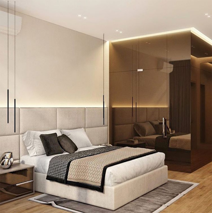 Un dormitorio moderno con vestidor.